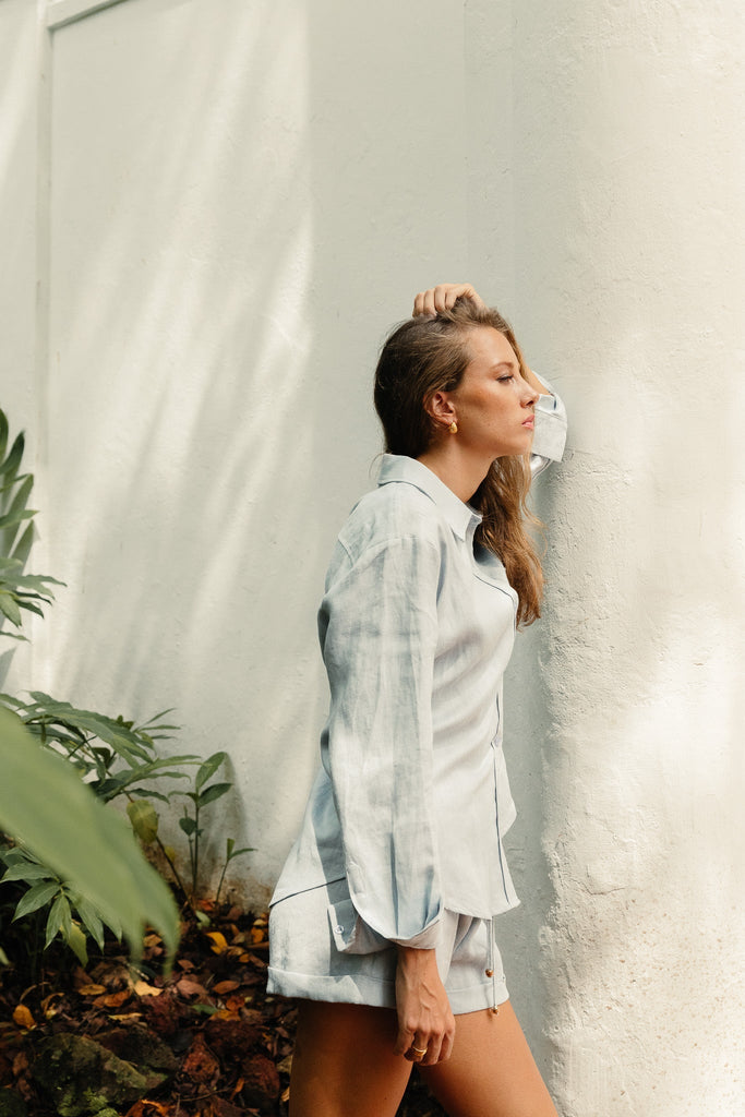 Model wearing the classic linen shirt in summery white