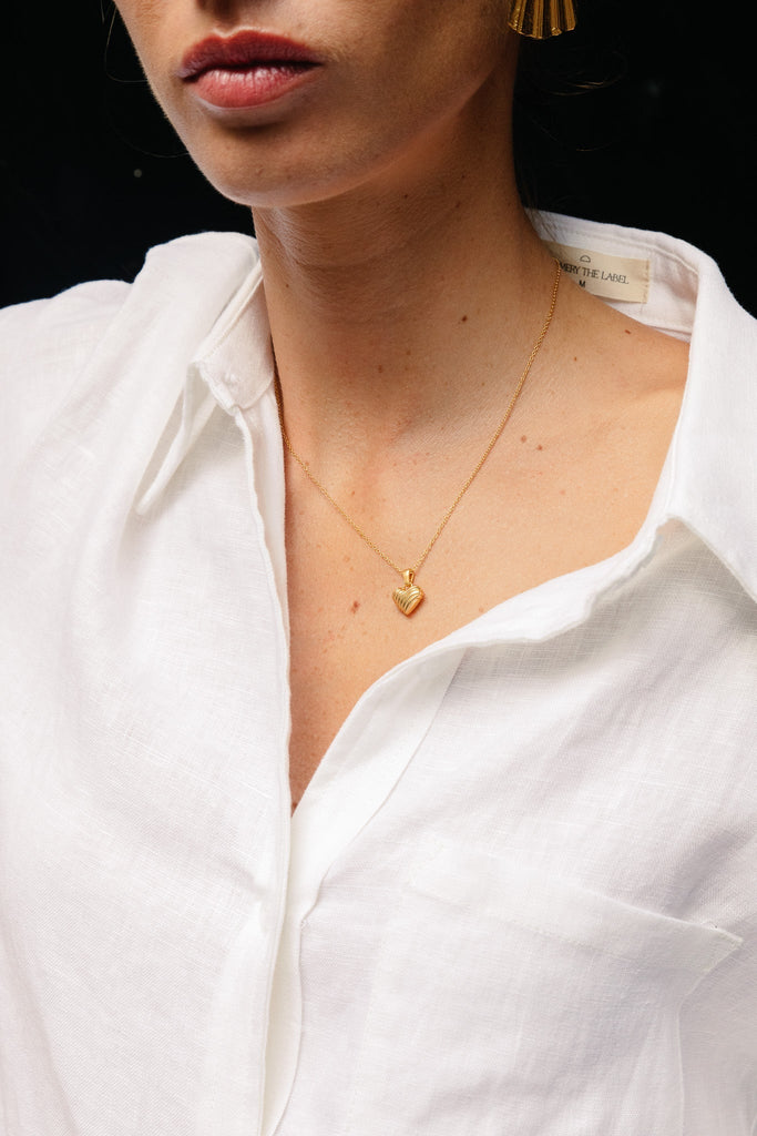Model wearing the classic linen shirt in summery white