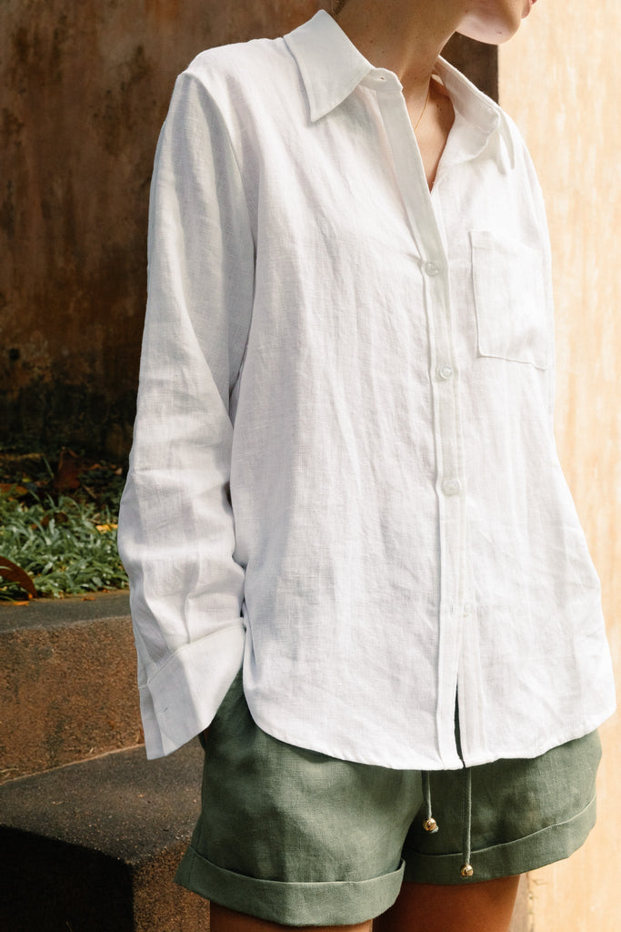 Model wearing the classic linen shirt in summery white