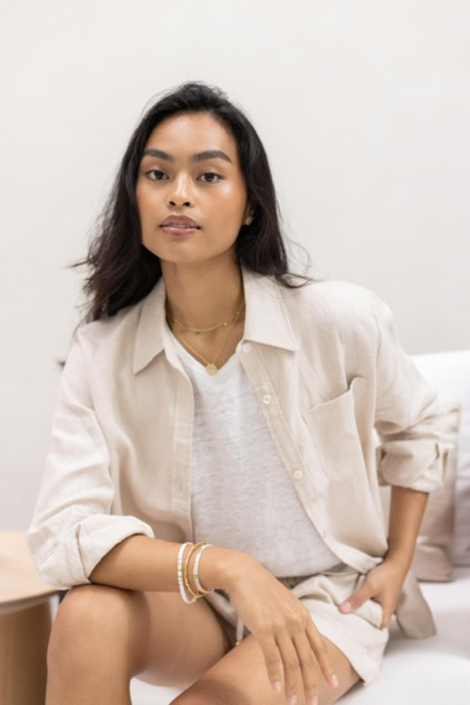 Model wearing the classic linen shirt in oat