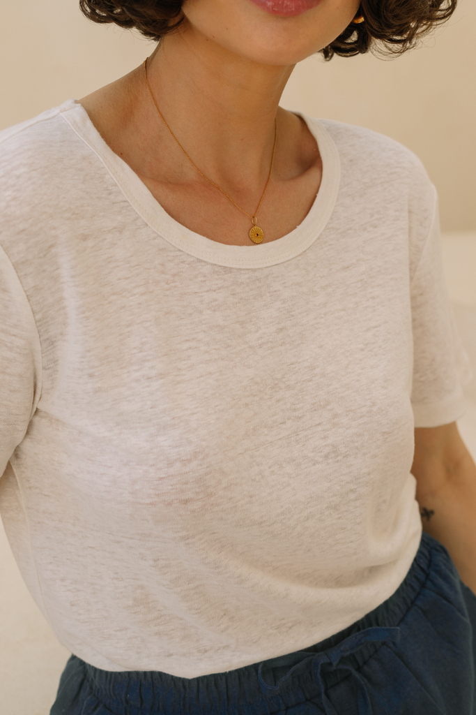White linen knit t-shirt by Summery The Label, perfect for breathable comfort and minimalist styling