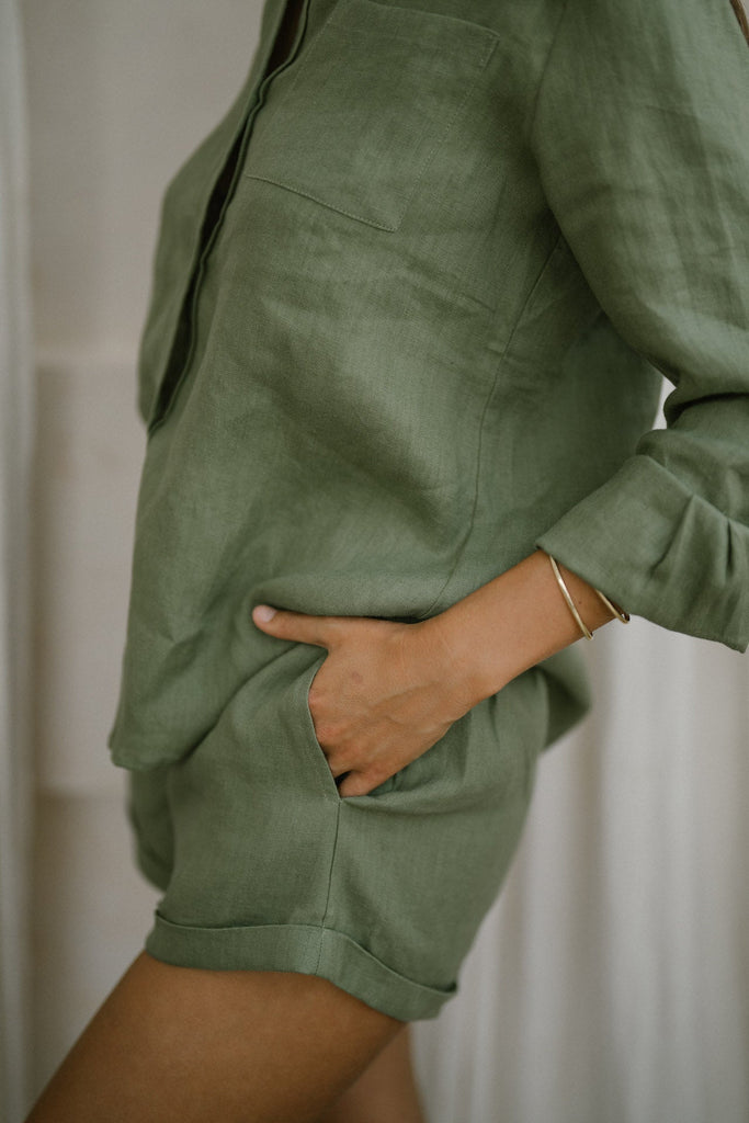 Model in classic linen shirt khaki green