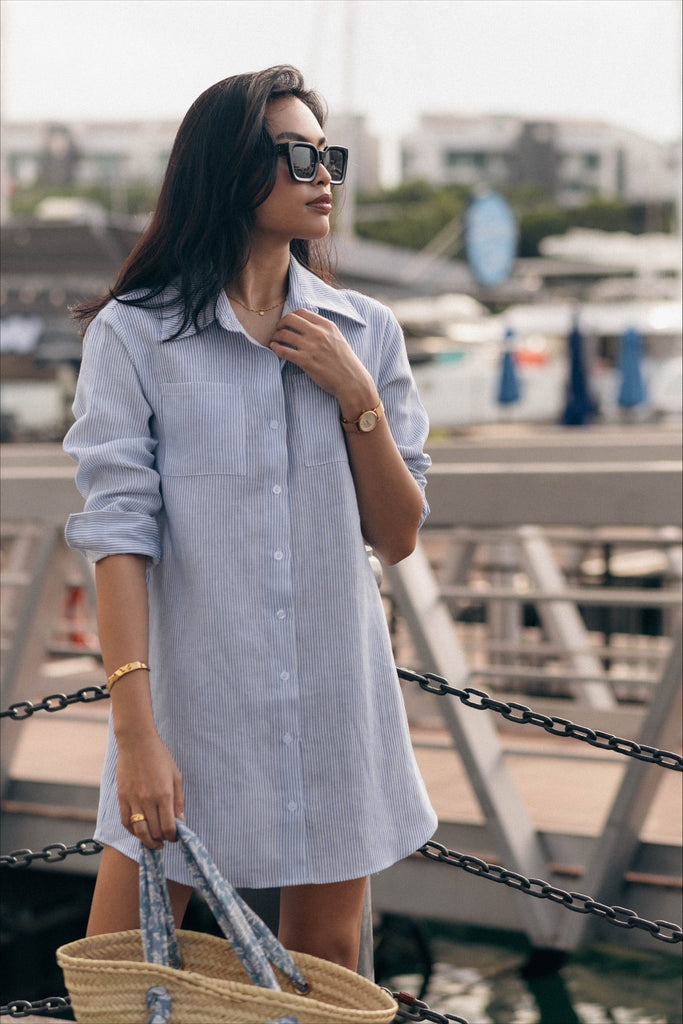 Model wearing the classic linen shirt dress in pinstripe