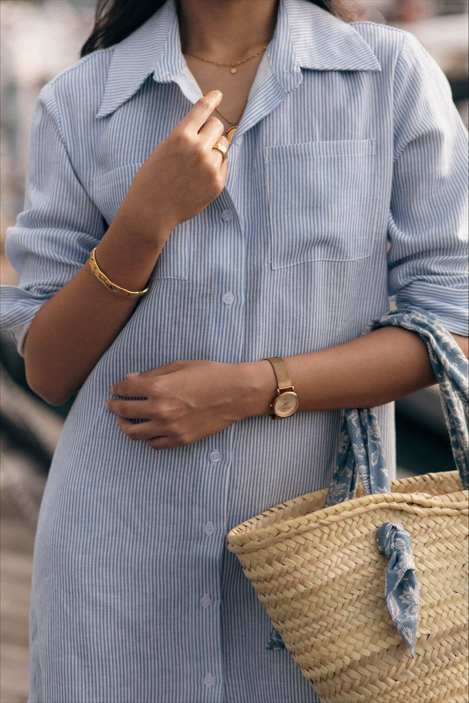 Model wearing the classic linen shirt dress in pinstripe