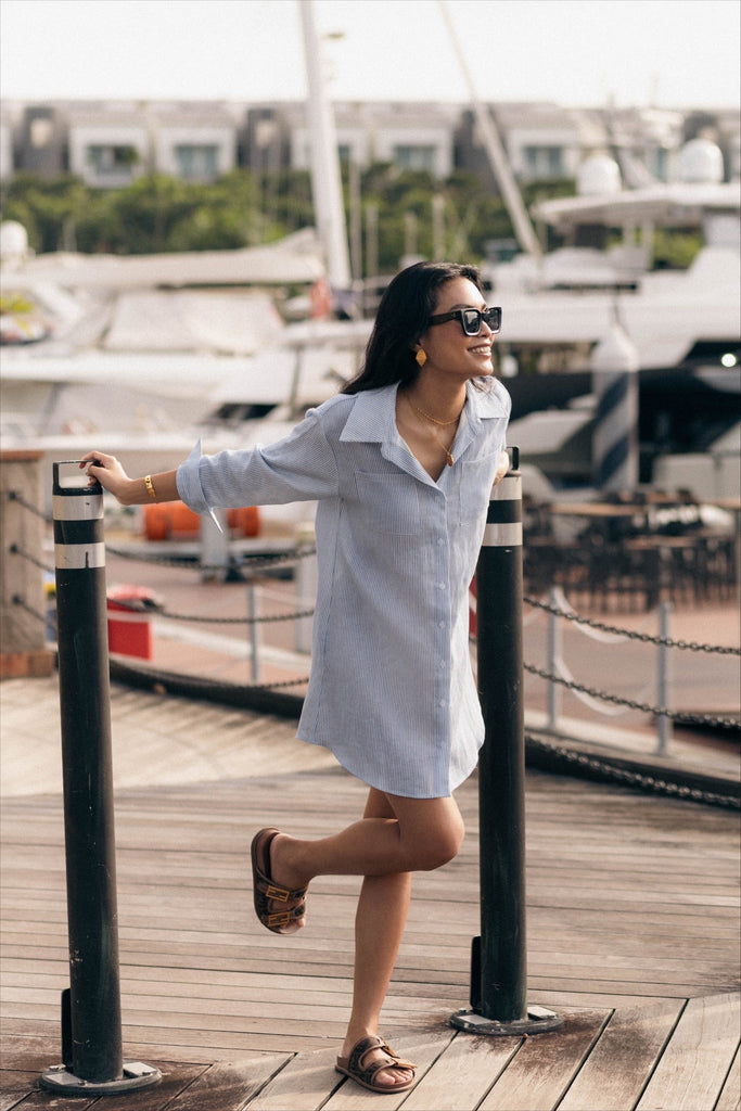 Model wearing the classic linen shirt dress in pinstripe
