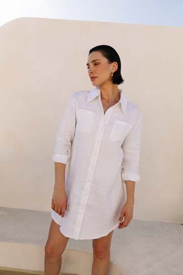 Model wearing a white linen shirtdress from Summery The Label, styled for light and airy comfort in the UK