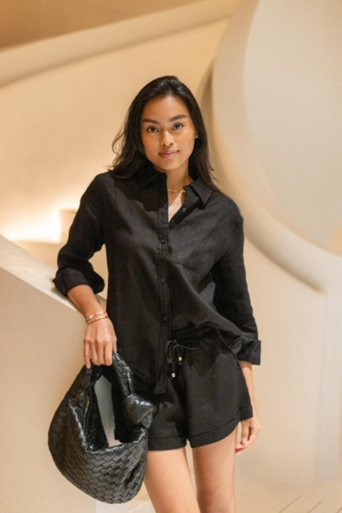Model wearing Summery The Label's classic linen shirt in black