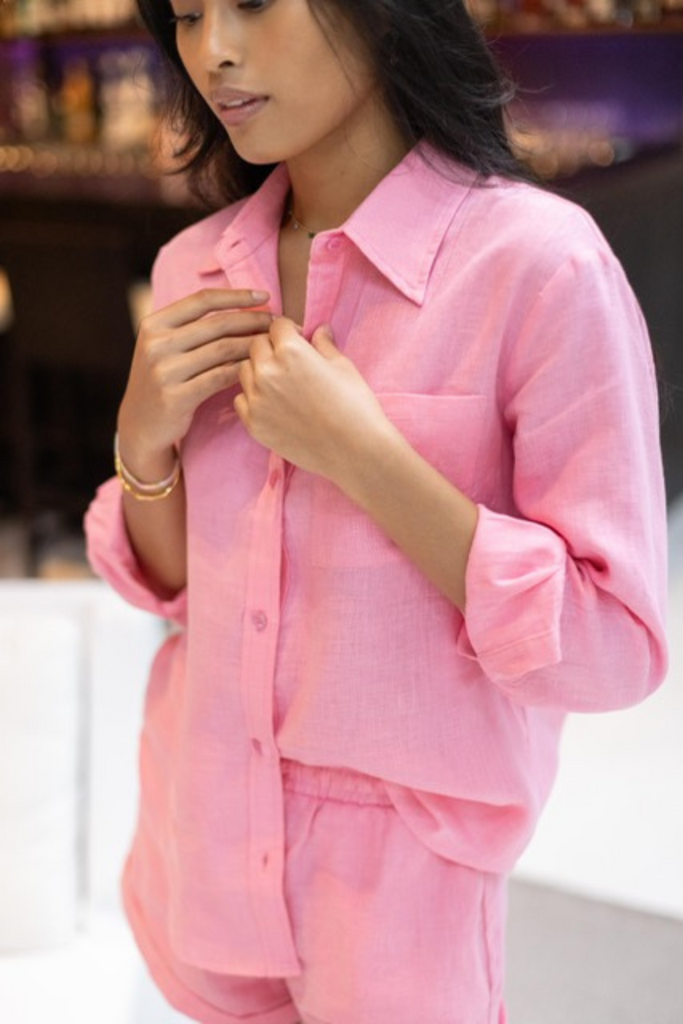 Model wearing the classic linen shirt in french pink