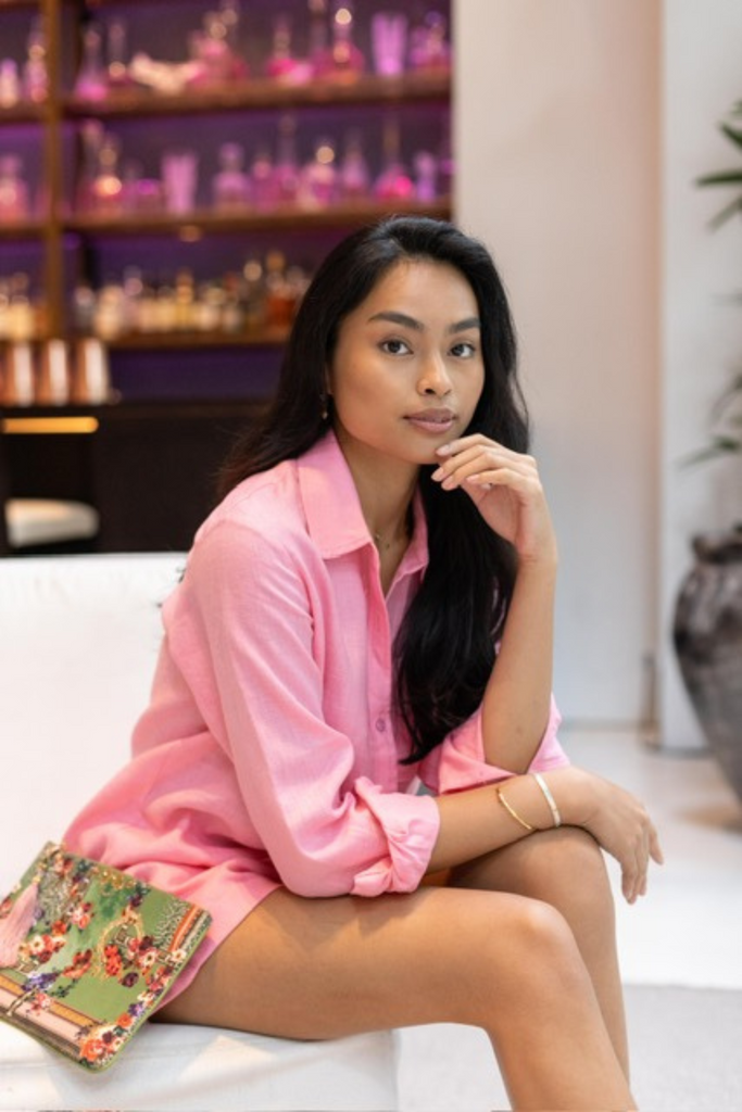 Model wearing the classic linen shirt in french pink