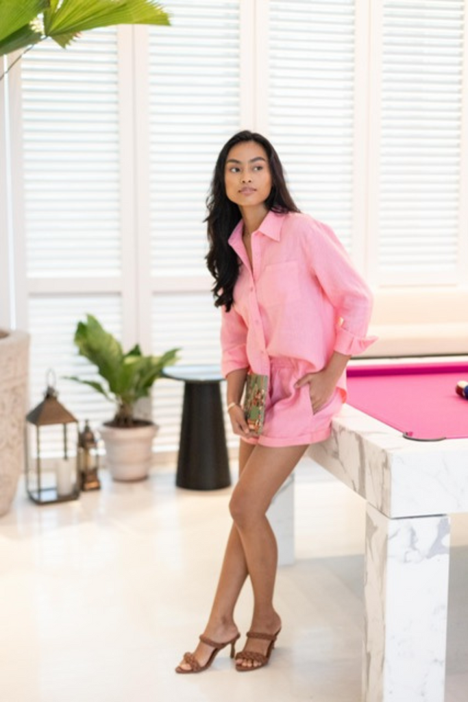 Model wearing the classic linen shirt in french pink