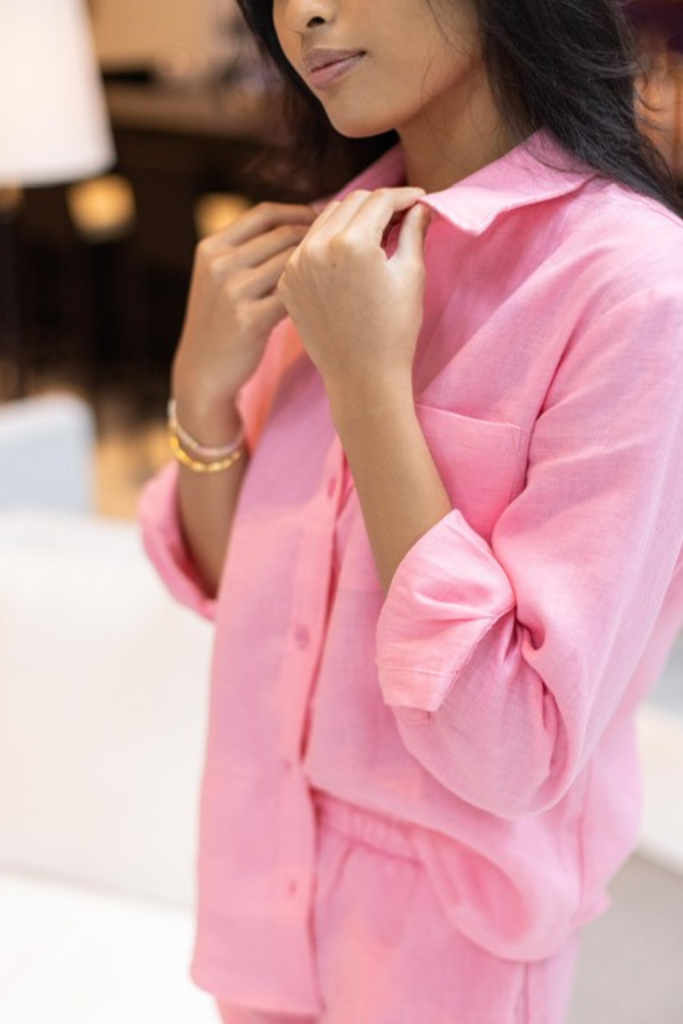 Model wearing the classic linen shirt in french pink