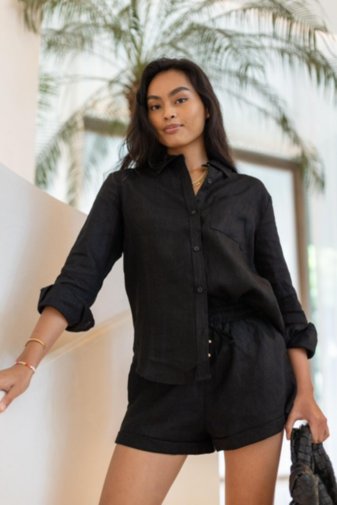 Summery The Label's model wearing the classic linen shorts in black