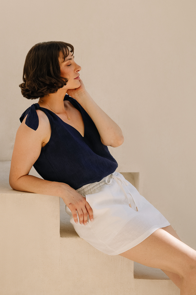 Lightweight white linen skort designed by Summery The Label for breathable comfort and minimalist charm